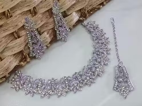 Amazing Rhodium Plated Necklace Set With Light Purple Color Kundan